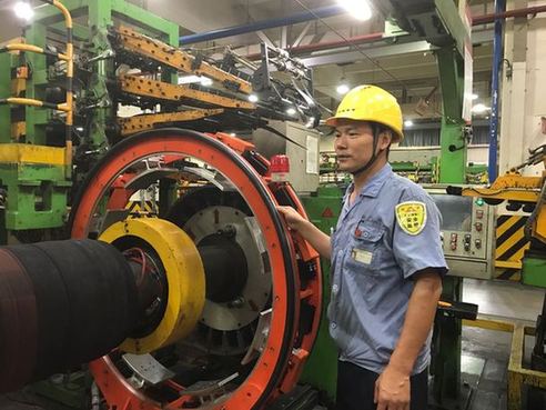 【中國夢·大國工匠】程海良:用“國產”取代“進口”的改造能手